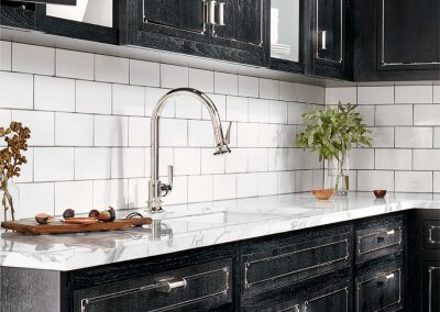 Black Cabinetry and White Tile Walls