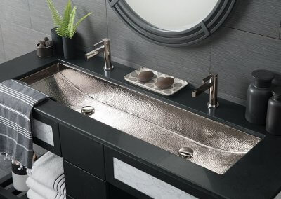 Modern Metal Sink and Black Countertops