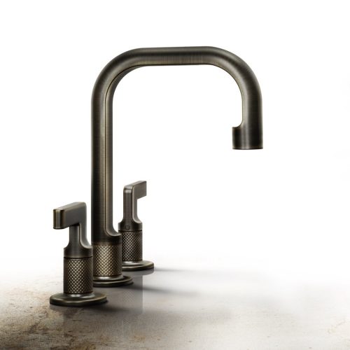 A sleek, modern bronze faucet with two matching handles on a reflective surface. The faucet has a high arc spout and textured handles, casting soft shadows on the background.